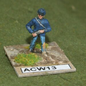 Artillerman in Kepi, holding charge.